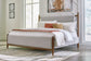 Lyncott King Upholstered Bed with Mirrored Dresser and Chest