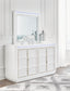 Chalanna King Upholstered Storage Bed with Mirrored Dresser and Nightstand